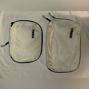 Thule White and Black Travel Packing Cube Set (2) small and medium size.